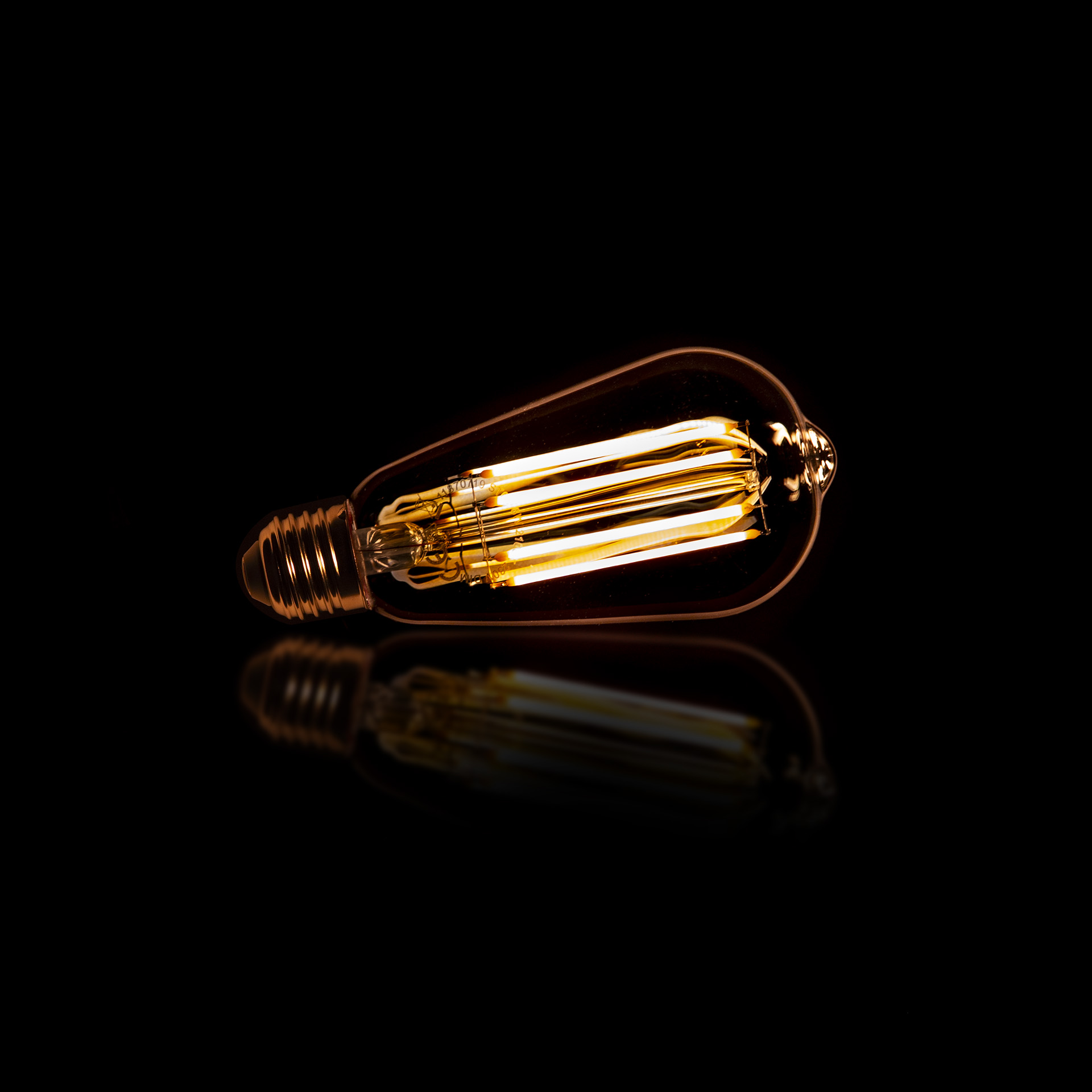 Lichtbron LED [ST64] filament druppel - E27 6W 2100K 450lm dimbaar / Amberkleurig glas